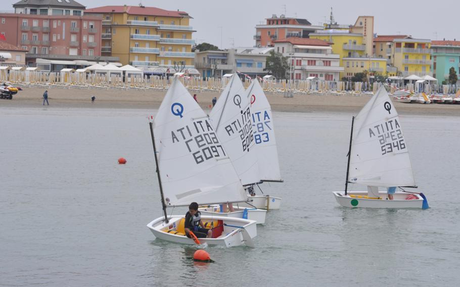 A group of Italian youth participate in a regatta off the beach of Caorle, Italy, recently. The beach in the background will be be packed with visitors on most days in the coming months. But there&#39;s more to Caorle than the beach.