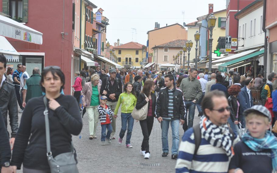 The Italian city of Caorle is seemingly always full of tourists, whether it&#39;s Italian families shown here during a recent visit, or German tourists in the summer months.