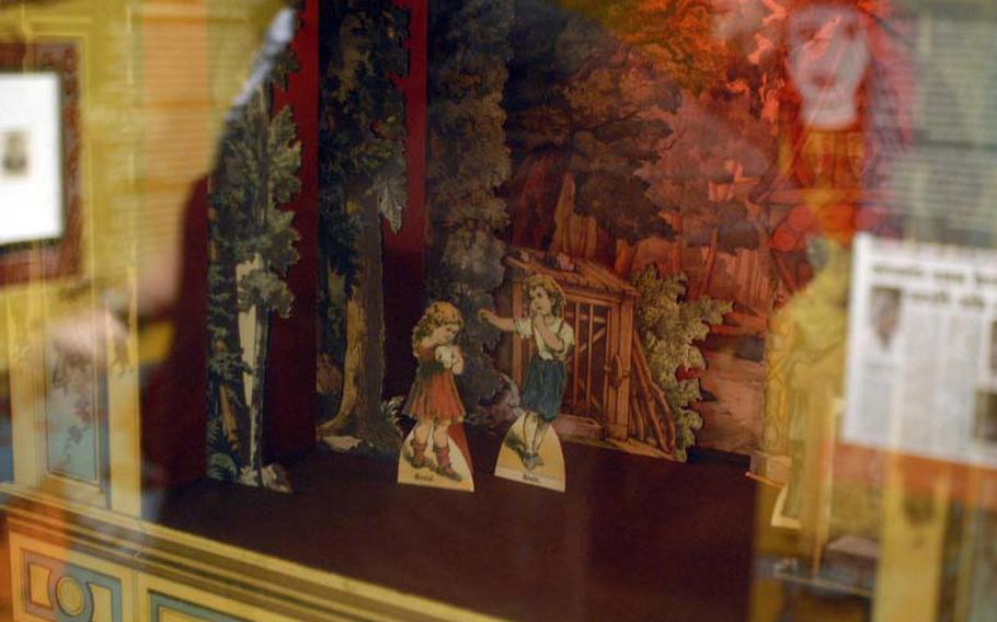 A reconstruction of an 1880 paper theater of "Hansel and Gretel" at the  Brüder Grimm-Haus in Steinau an der Strasse, Germany. Paper theater was a miniature form of plays that were usually assembled at home and performed for family and guests. This form of theater dates to the early 19th century in Europe.