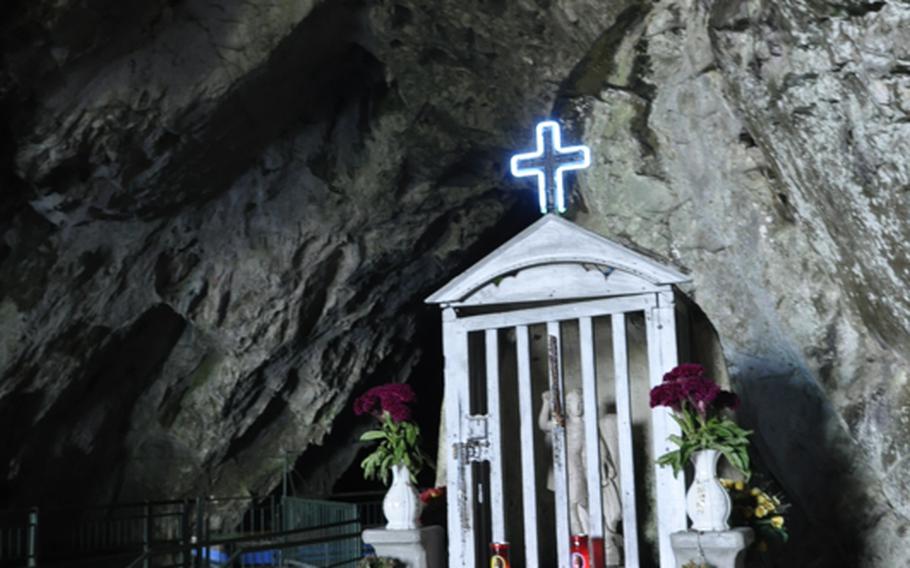 A small chapel dedicated to St. Michael the Archangel marks the entrance of the first cave. From here, visitors travel through a series of other caves decorated with dramatic stalactites and stalagmites.