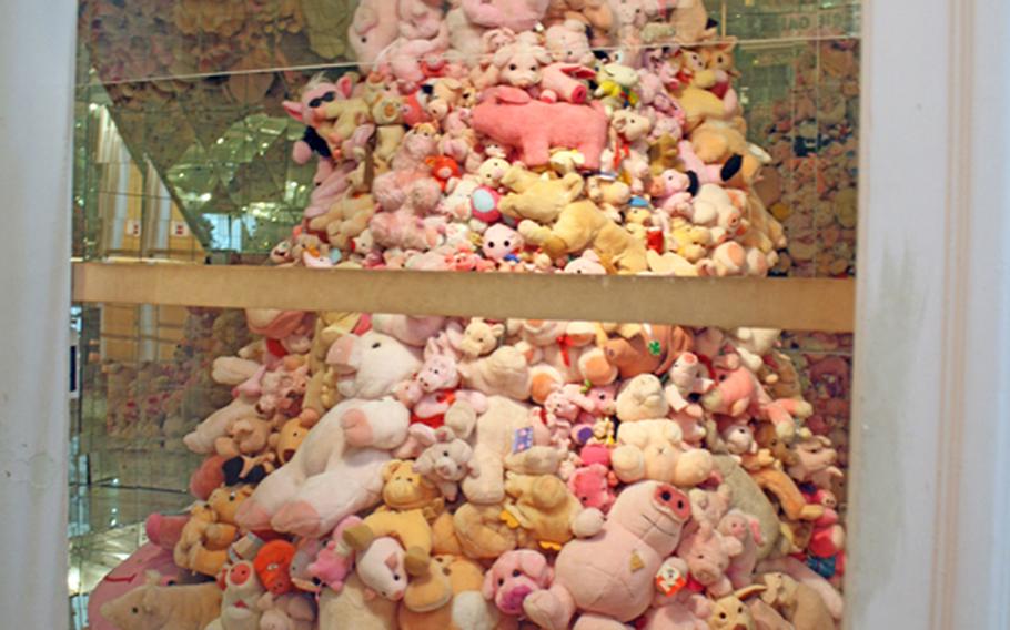 A pyramid of stuffed pigs are among the displays at the Schweine Museum in Stuttgart, Germany, billed as the world's largest museum devoted to swine. The museum features 50,000 pig objects of various shapes and sizes.