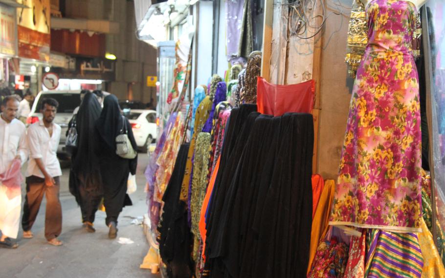 The Manama Souq features many shops that sell colorful traditional dresses and fabrics.