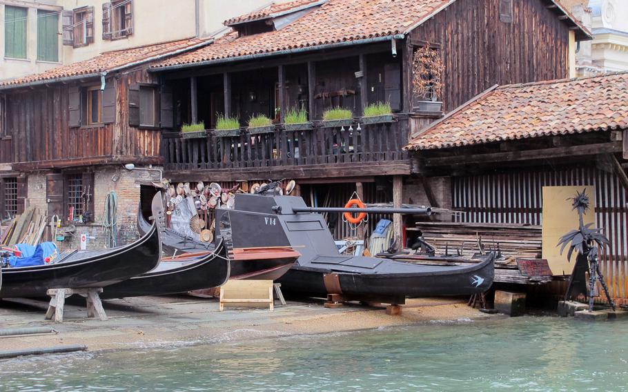 The boat house in Venice's San Trovaso Square is constructed of wood, as are gondolas.