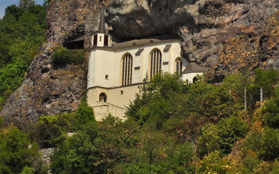 The Felsenkirche - or Church in the Rock - sits about 200 feet above Idar-Oberstein, Germany, built inside a natural niche along a towering rock face.