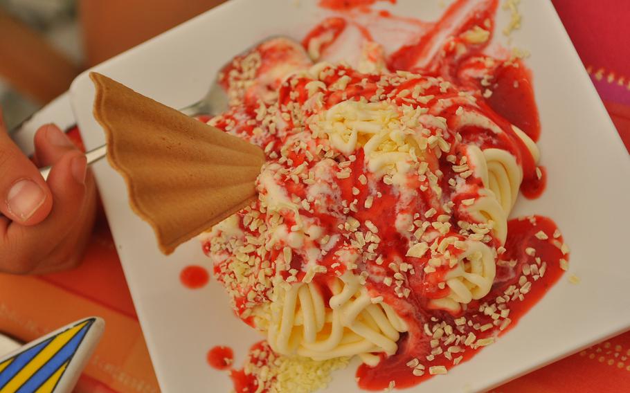 A mound of "spaghetti Eis" - soft vanilla ice cream made to look like spaghetti noodles, covered with strawberry sauce - was the perfect treat after hiking in the hills above Idar-Oberstein, Germany. There are several outdoor ice cream cafes lining the town center.