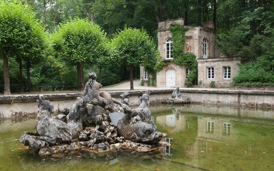 A grotto is tucked away in the forest surrounding the Gardens of the Hermitage in Bayreuth, Germany.