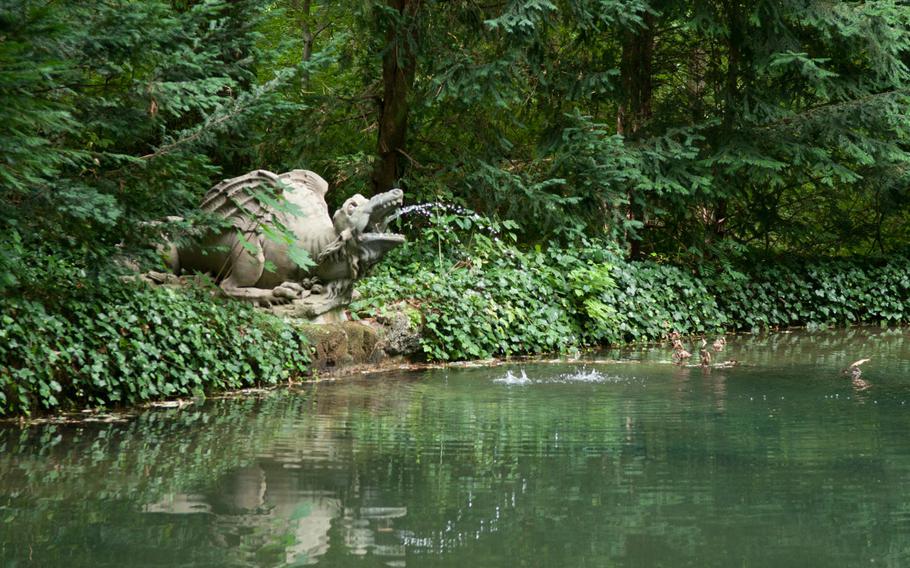 This small dragon statue is found along the footpath between the palaces and the lower grotto in the Gardens of the Hermitage in Bayreuth, Germany.