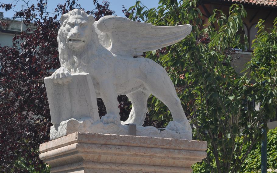 Visitors to Lido can't be faulted for thinking they're no longer in Venice, possibly because of the island's vehicle traffic. This statue of the Lion of St. Mark — the symbol of Venice — is one clue to its ties to the city across the lagoon.