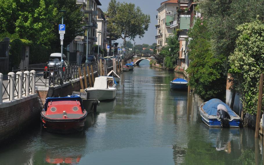 Though there are cars on Lido — unlike the majority of Venice — there are still canals, and private and commercial boats are never far from sight.