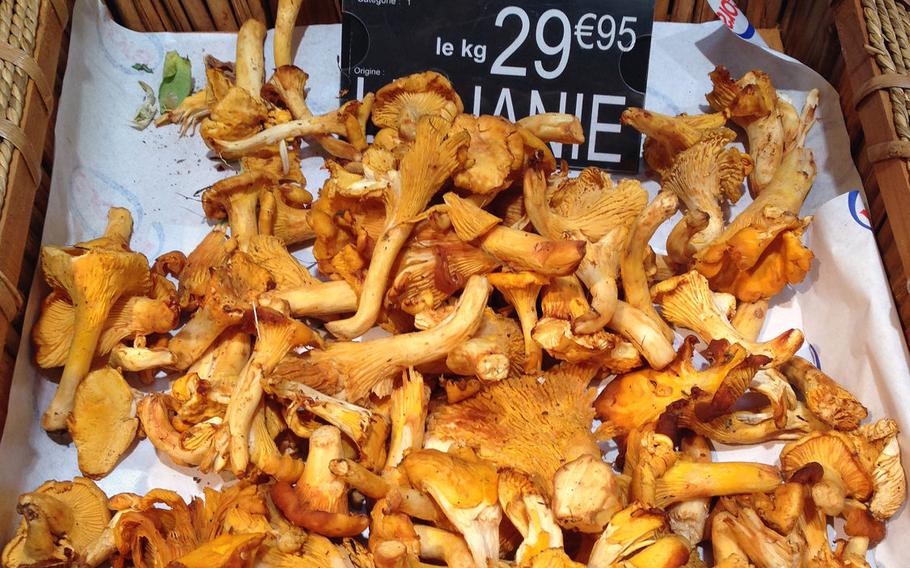 Girolle mushrooms — also known as golden chanterelles — are one of the seasonal offerings sold in the produce section of Cora, a super store.