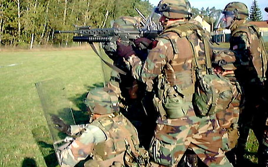 Students at the Interservice Nonlethal Weapons Instructor Course at Fort Leonard Wood, Mo., practice riot control tactics. Manuevers like this are common knowledge to law enforcement officials and military police, but most soldiers and Marines find them a novel change from the usual field tactics exercise.