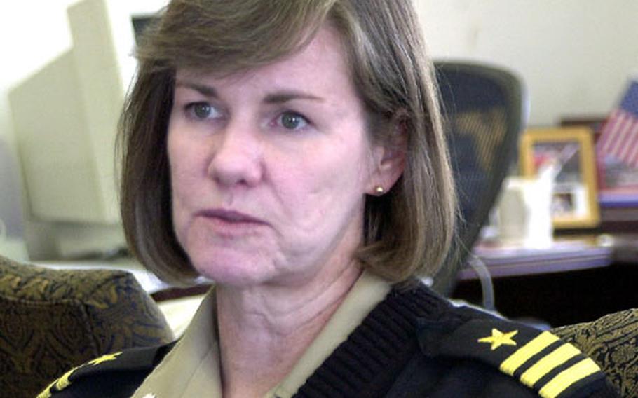 Cmdr. Carol Shivers, chief staff officer for Sasebo Naval Base, started her career in the Navy as an enlisted sailor.