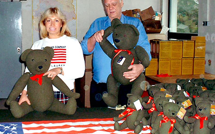 Evelyn (Koch) Geisbauer, the great-granddaughter of the company’s founder Marcus Koch and current owner of Hugo Koch Spielwarenfabrik, and her husband, Wolfgang, show off their limited-edition large G.I. Teddies. Only 50 of the large G.I. Teddies were produced.