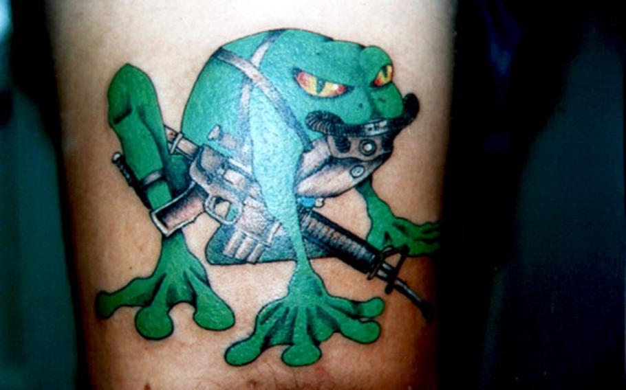 This tattoo is popular with Army Rangers on Okinawa, says tattoo artist Ken Schuur.