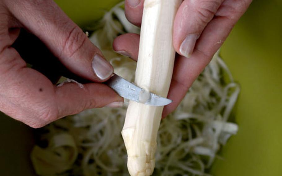 Experts say it&#39;s best to peel asparagus back from the tip. The peels can be used to cook asparagus soup.