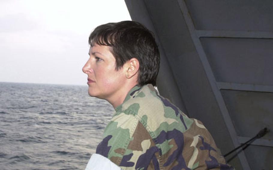 Senior Chief Petty Officer Rebecca Richey, a brig corrections specialist and master at arms, is among a small group of Navy moms deployed on the USS Carl Vinson. Richey says without e-mail, it would nearly be impossible to keep in touch with her busy teenage children.