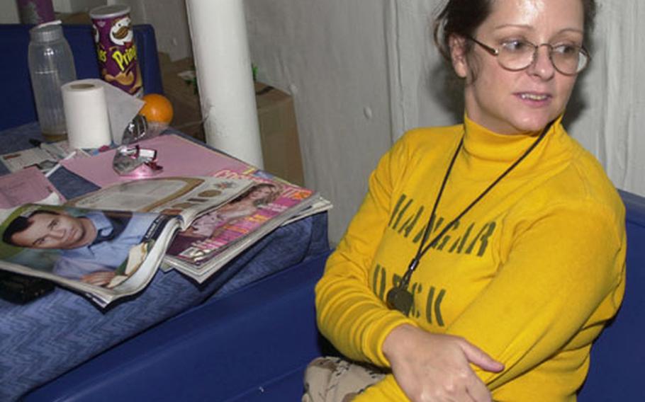 Chief Petty Officer Maggie Arriola, a Navy mom deployed on the USS Carl Vinson, takes comfort from knowing her Mr. Mom husband tends to the house and kids when she&#39;s deployed for long stretches.