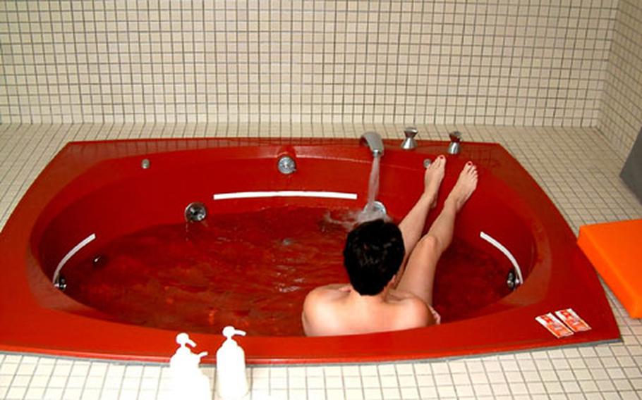 Many of Okinawa’s love hotels offer rooms with hot tubs. Some go just to get away from the military base hubbub.