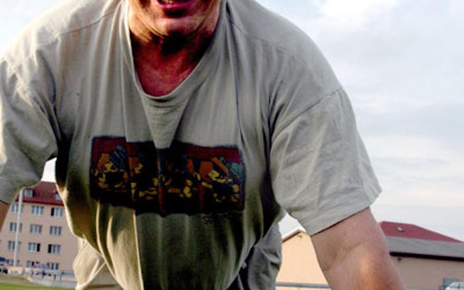 Gene Hickmann, 55, aims for 15 push-ups.