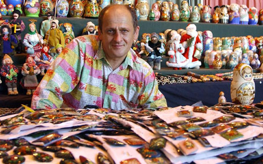 Lisa Horn/Stars and Stripes Yori Volnsky, operates Rial.Moldov, along with his wife, Larissa. They feature an assortment of handcrafted items from Russia, including Russian stacking dolls. Their wares were among the many items on sale at the annual 86th Services Ramstein Welfare Bazaar at Ramstein Air Base, Germany, in September.