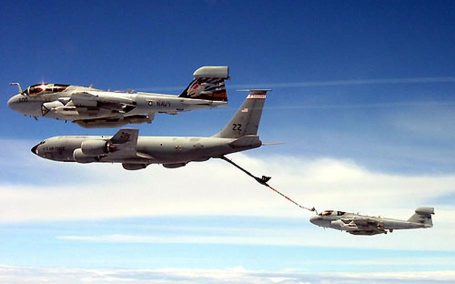 Two EA-6B Prowlers refuel during a training exercise last month over Guam.