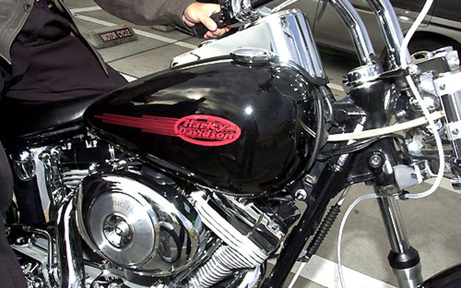 Harley riders at Yokota Air Base, Japan, say a Harley’s V-twin engine is superior to all other motorcycles. It has a unique sound, described as a low “potato, potato,” rumble, describes one rider. The Harley Davidson Motor Co. recently celebrated its 100-year anniversary.