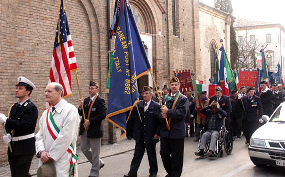 Members of the Veterans of Foreign Wars join Italian vets in a parade in Treviso, Italy, in April, honoring a World War II cavalry unit.
