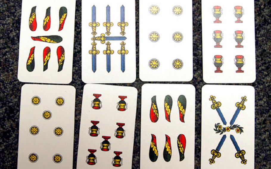 The top row of cards shows an example of a hand that would win the “primiera or settanta” point as spelled out in the rules.