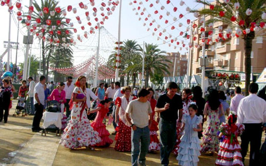 Revelers enjoy  in Sanlucar de Barrameda, Spain.