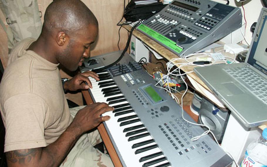 Sgt. Marion Saunders, shown here practicing on a keyboard, was going to be featured on the album before an insurgent attack severely injured his leg. His injury inspired the song, “@uck#m.”