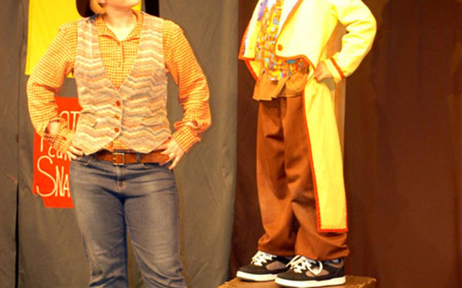 Actor/director Kylie Orr of the Missoula Children’s Theatre, left, shares a scene with Alex Villa as Dr. Ozzy during a dress rehearsal for “Wiz of the West.”