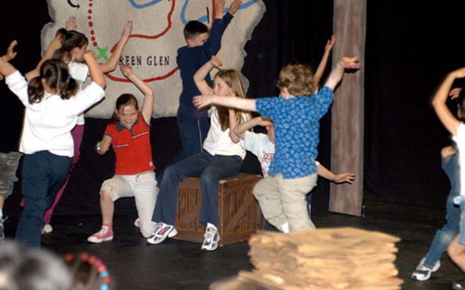 Buzzards surround members of the Munch Kin during a mid-week rehearsal for the "Wiz of the West."
