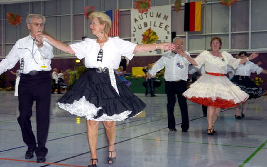 Couples dance the night away at the Beaux and Belles Square Dance Club’s Autumn Jubilee in Frankfurt, Germany, in September. European nationals have kept the traditionally American activity alive in areas where, in days gone by, American soldiers and Europeans used to dance and mingle.