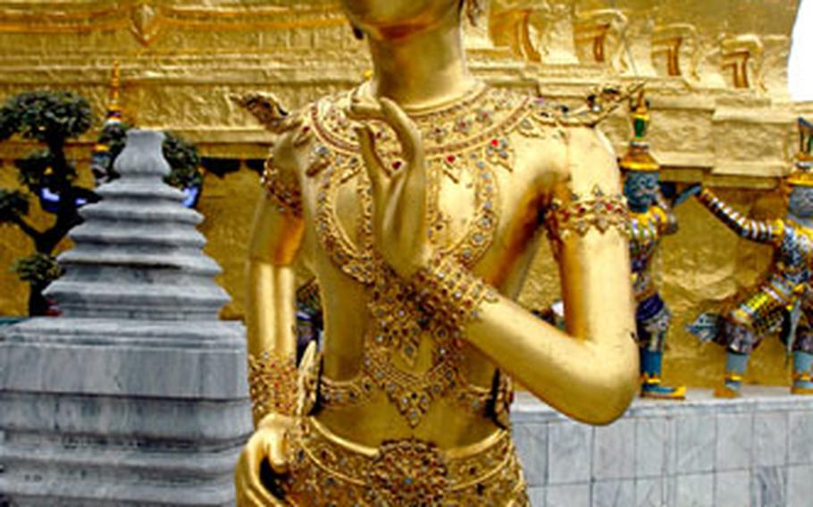 One of many golden statues on the grounds of the Grand Palace, the former home of Thailand’s royal families.