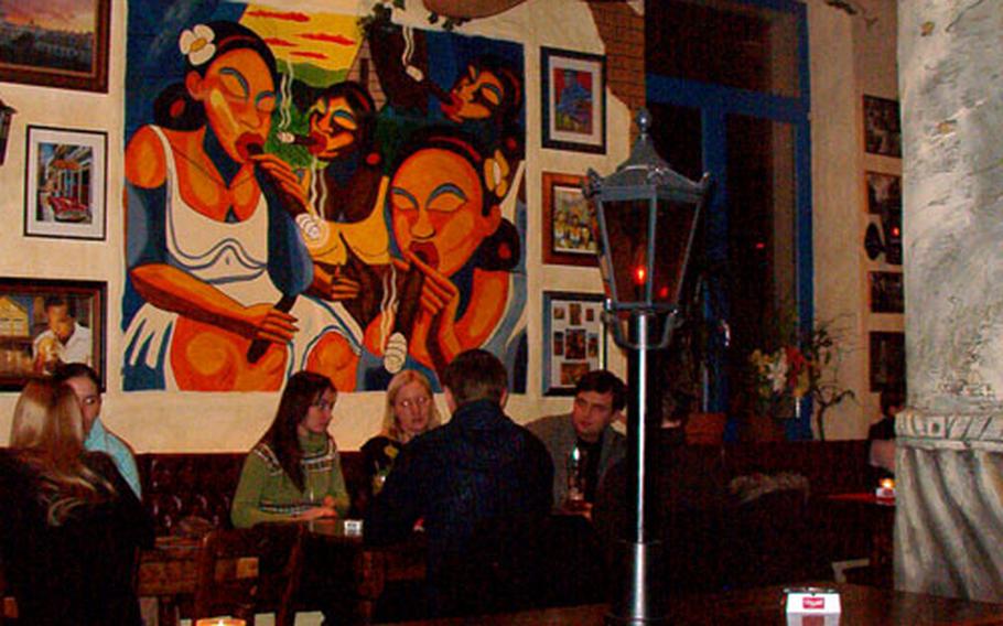 Patrons enjoy a quiet dinner at the Cubana Cocktailbar and Restaurant in Darmstadt, Germany. After 9 p.m., the music turns a more festive.