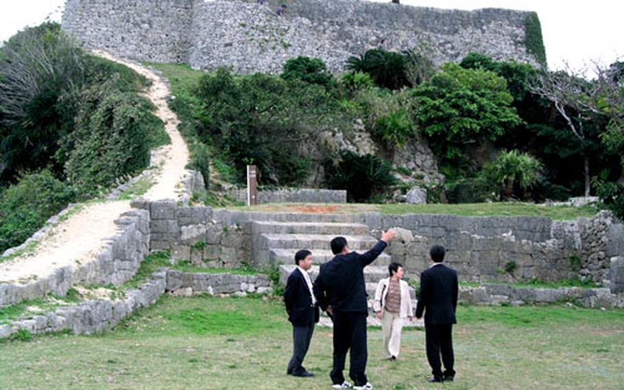 Katsuren Castle is on the Katsuren Peninsula, overlooking both the East China Sea and the Pacific Ocean. The 15th-century castle site is listed as a World Heritage Site by the United Nations.