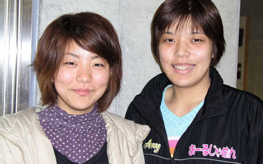 Natsumi Moriya, left, and her sister Sayaka Nakachi are part of the local musical group Amawari Roman. Their musical, "Amawar," is helping change the image of a former feudal lord, Amawari, from traitor to hero.