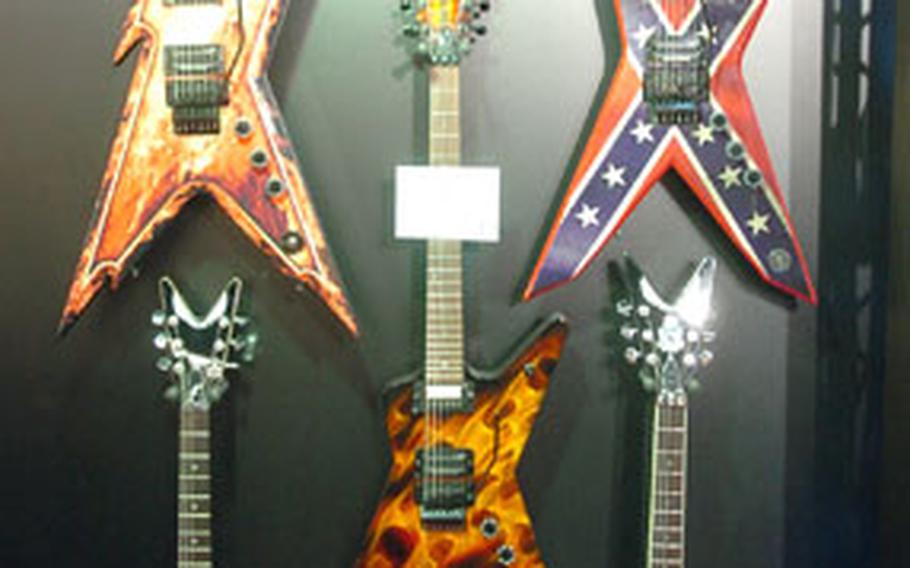 The Dean Guitars display at the 2006 Frankfurt Musikmesse features a tribute to the late metal guitar legend “Dimebag” Darrell Abbott.