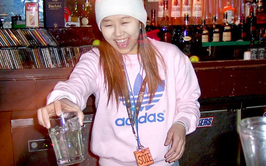 Soie and the other bartenders at No.10 Western Bar in Uijeongbu, South Korea, find creative ways to amuse patrons.