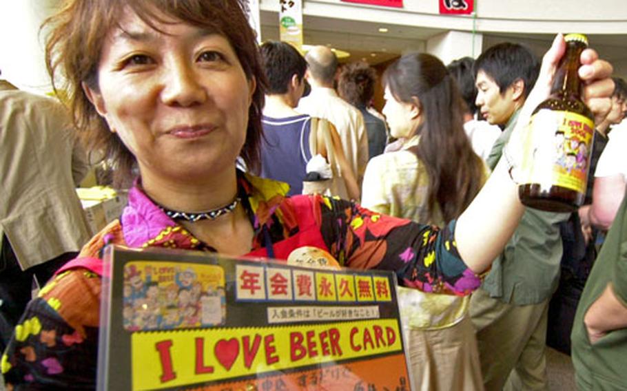 A woman offers a microbrew during the Great Japan Beer Festival at Yebisu Garden Place in Tokyo. The annual two-day event in early May attracted more than 3,000 visitors, including dozens of U.S. servicemembers.