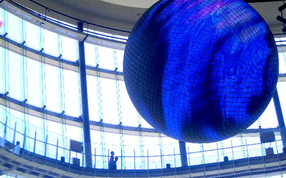 The striking Geo-Cosmos globe inside Miraikan features one million light-emitting diodes (LEDs) to show various features of Earth.