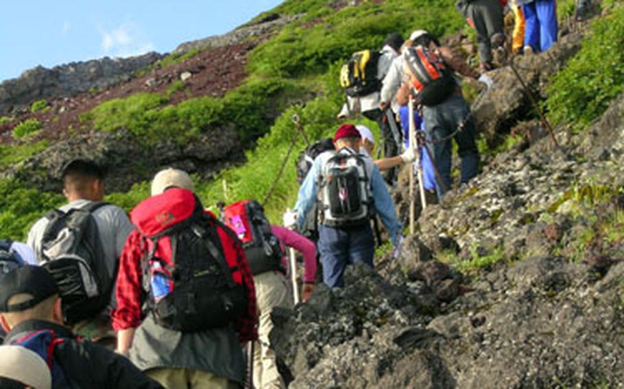 Over 200,000 people attempt to climb Mount Fuji every year, most of them in the official climbing season of July and August.