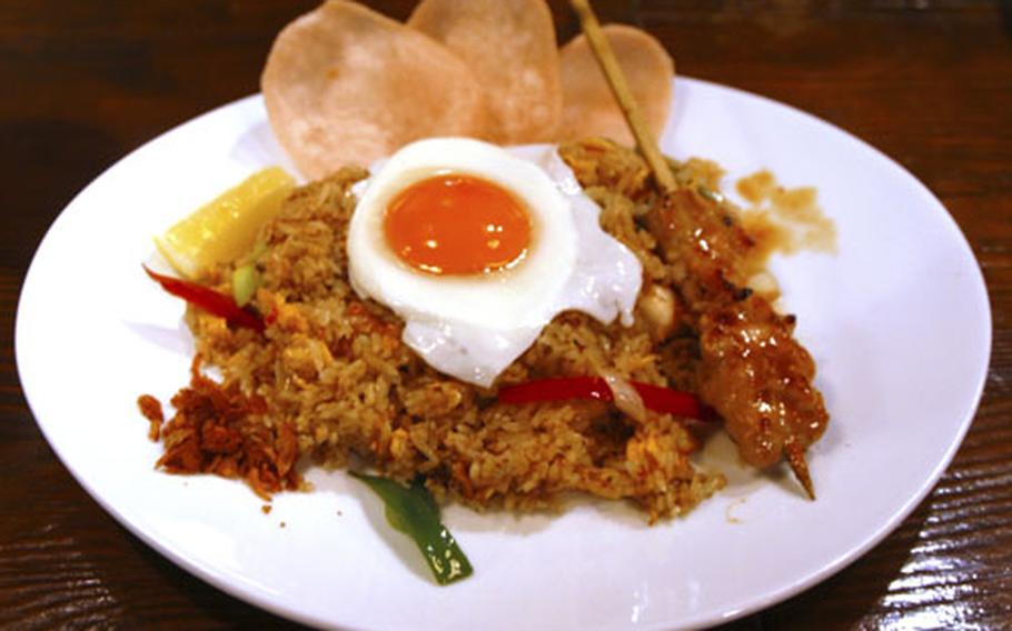 One of Monsoon Café’s Asian-themed rice dishes awaits a hungry customer. The establishment is a few minutes walk from Roppongi and the Hardy Barracks Army complex in Tokyo.