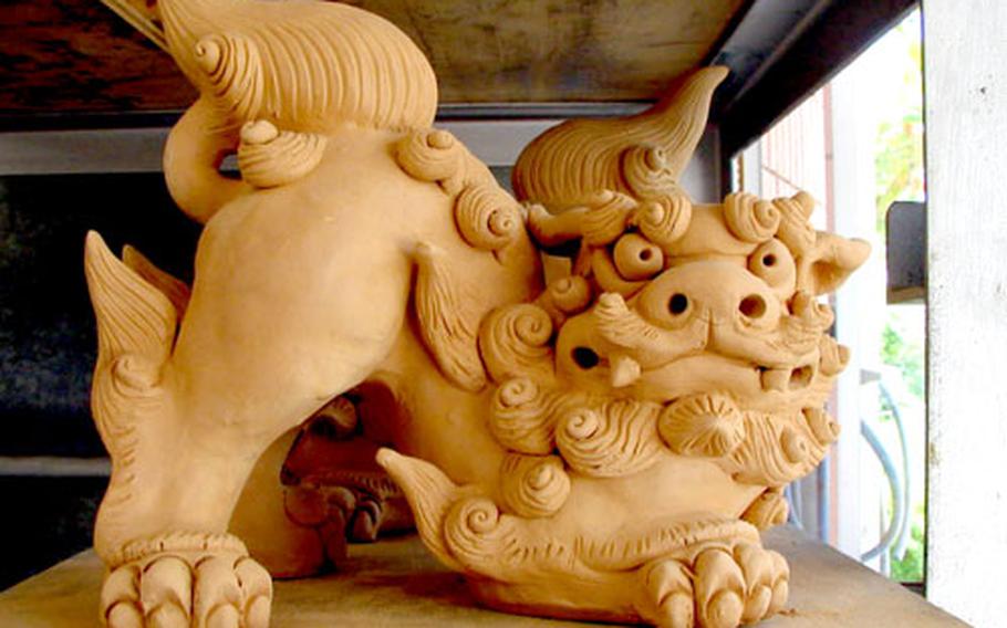 A work in progress by artist artist Jouei Shimabukuro, this Shisa is being set aside to dry for two weeks by before being baked in a kiln and painted. Shisas, or lion-dogs, are Okinawa&#39;s traditional guardians of homes and businesses.