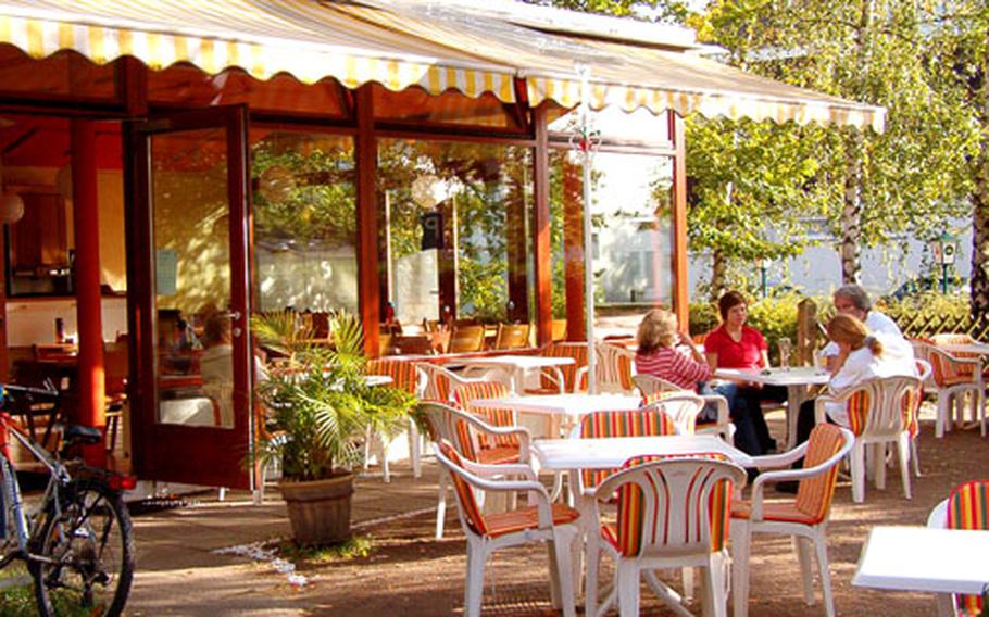 Patrons enjoys a Sunday afternoon at the Radieschen restaurant in Darmstadt-Eberstadt, Germany.