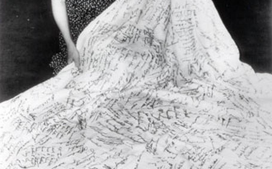 At a dinner celebration after Jimmy Doolittle’s first all-instrument flight in 1929, Joe Doolittle asked her guests to sign her white damask tablecloth. Later, she embroidered the names in black. She continued this tradition, collecting hundreds of signatures from the aviation world.