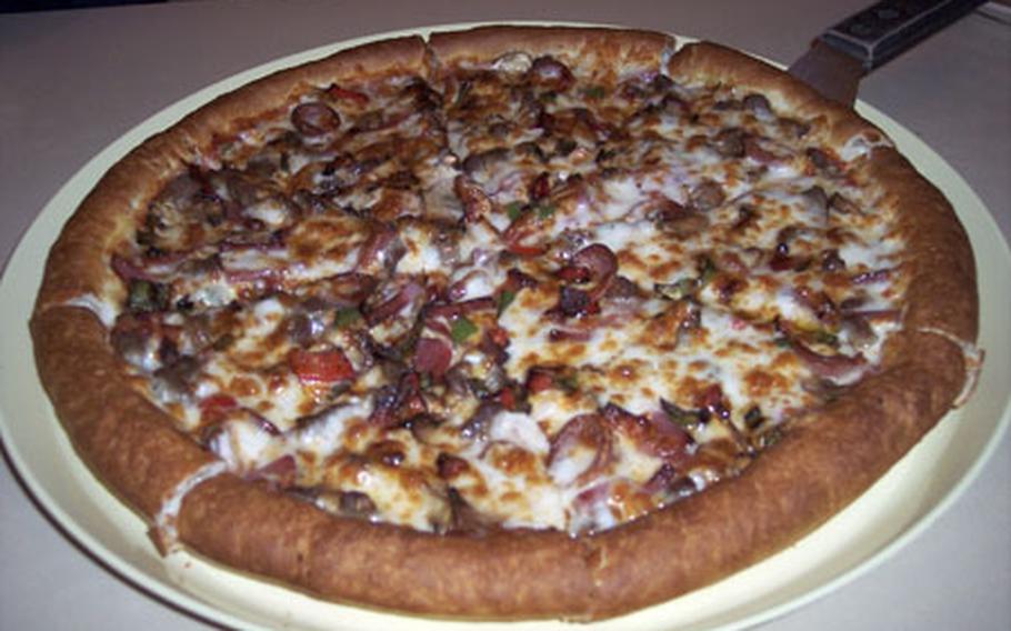 A large pizza with six or seven toppings runs about $20 at Valentine’s restaurant in Kunsan city, South Korea.