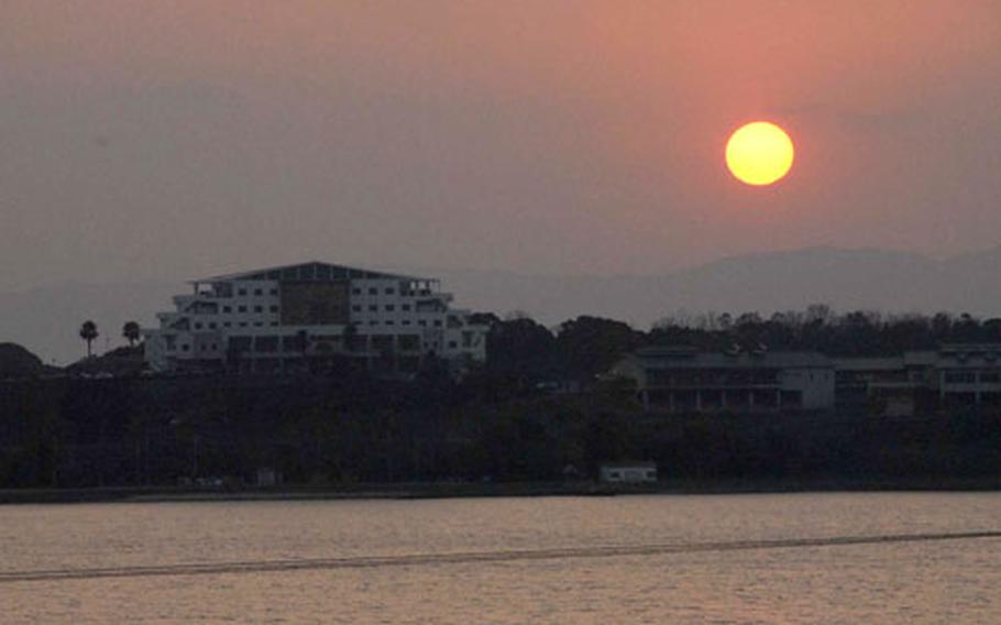 The sun sets over Siosai No Yu onsen near Osaki campground in Nagasaki Prefecture.