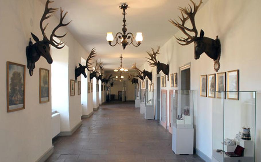 Hunting trophies and paintings with a hunting theme hang on the walls of the Jagdschloss Kranichstein museum, a former ducal hunting lodge. Today, the lodge is a museum, hotel and restaurant.