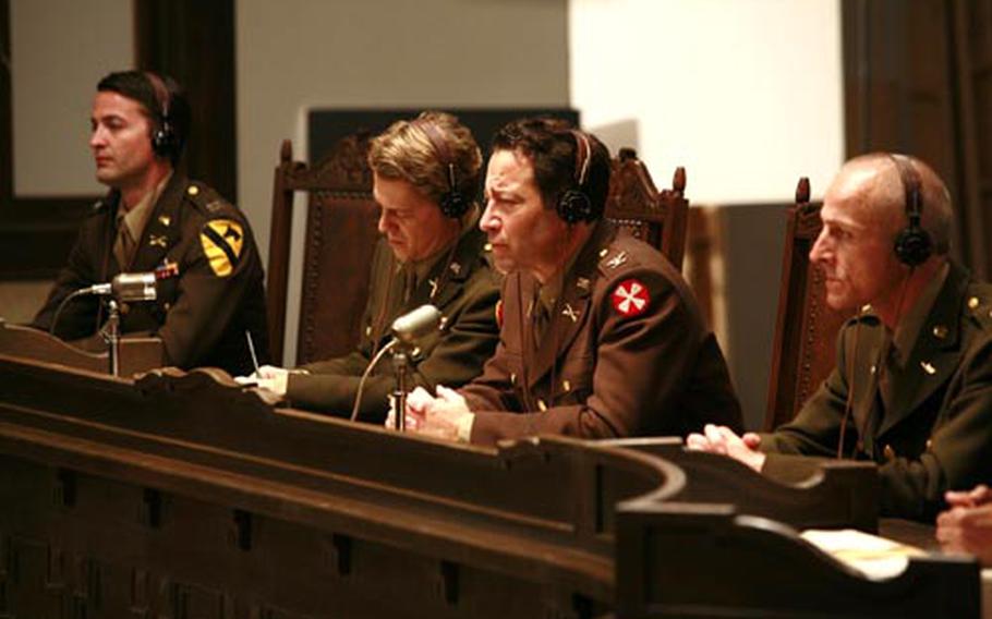 Judge Col. Louis Rapp (Richard Neil), second from right, is listening to at the Yokohama Distrcit Court.